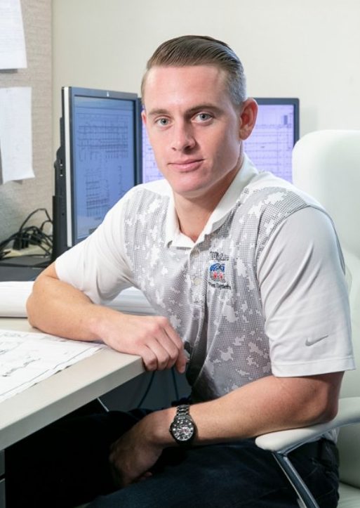 Engineer sitting at table