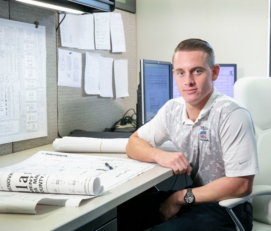 Engineer sitting at table