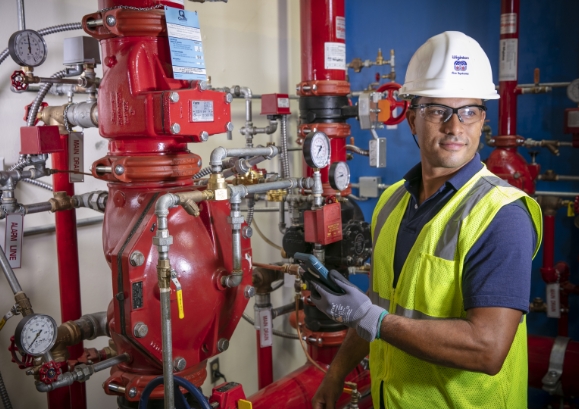 WFS worker looking at gauges